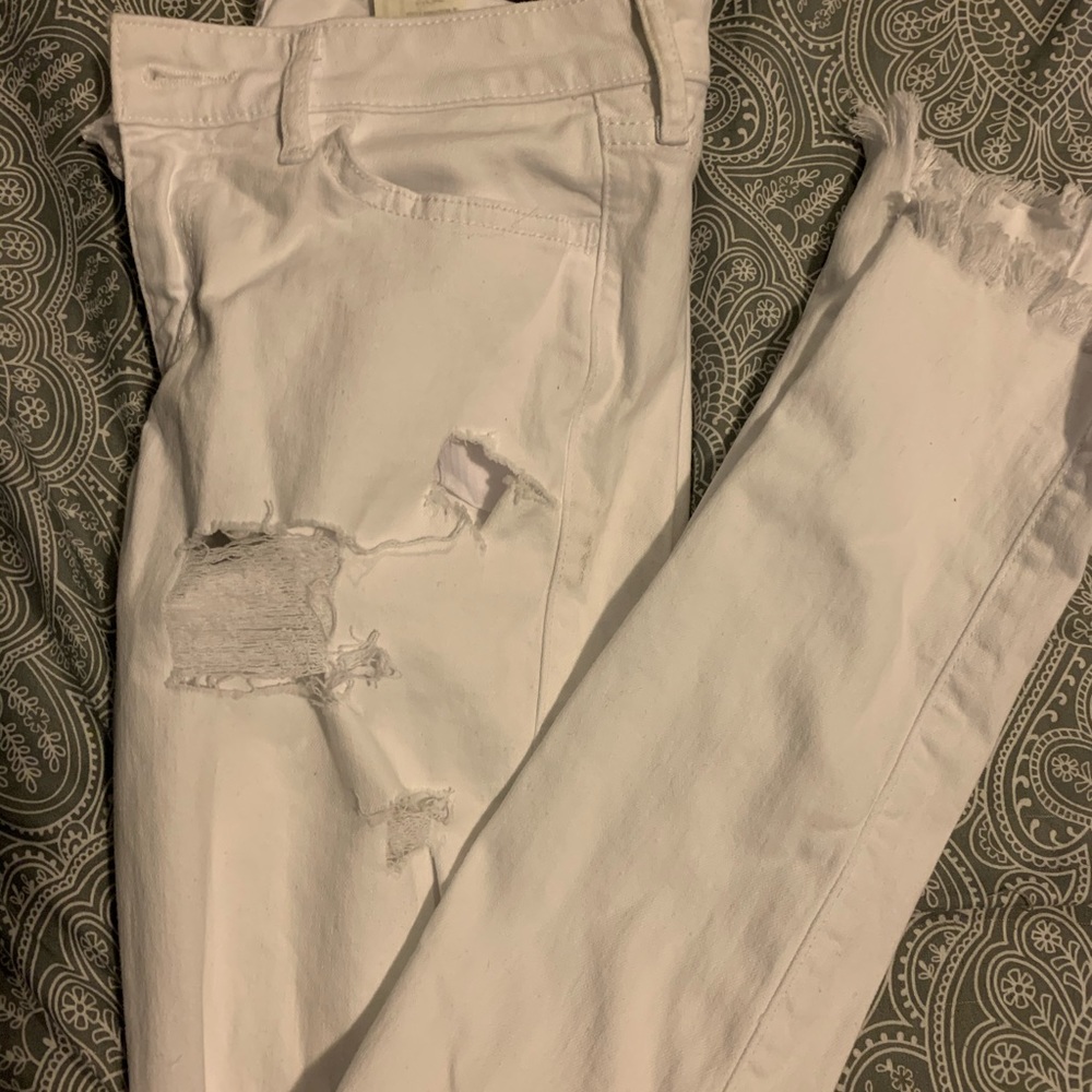 White distressed super skinny jeans